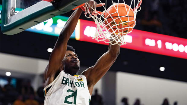 Baylor Bears center Yves Missi dunks against the Texas Tech Red Raiders.